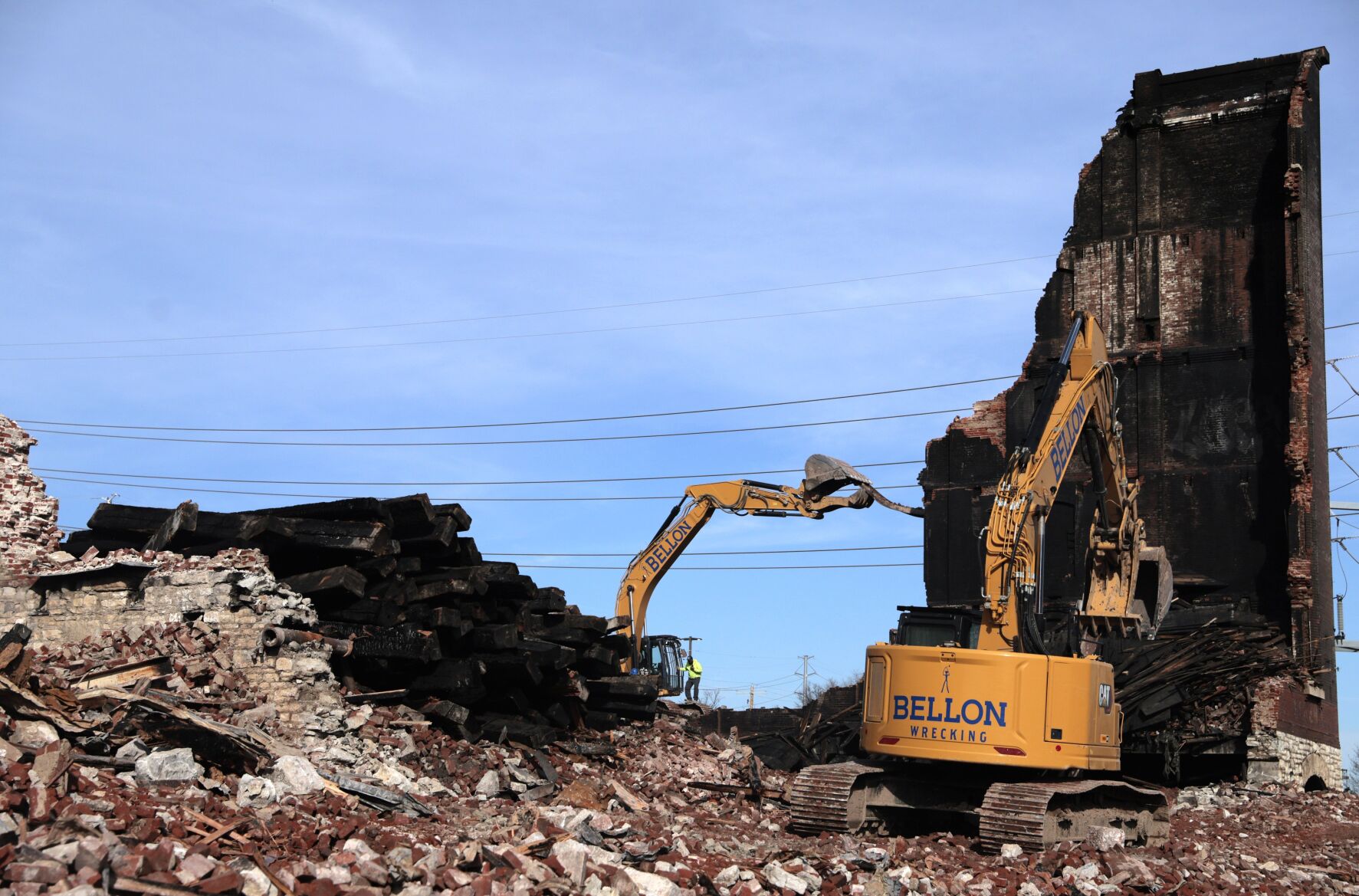 Demolition on burned out warehouse
